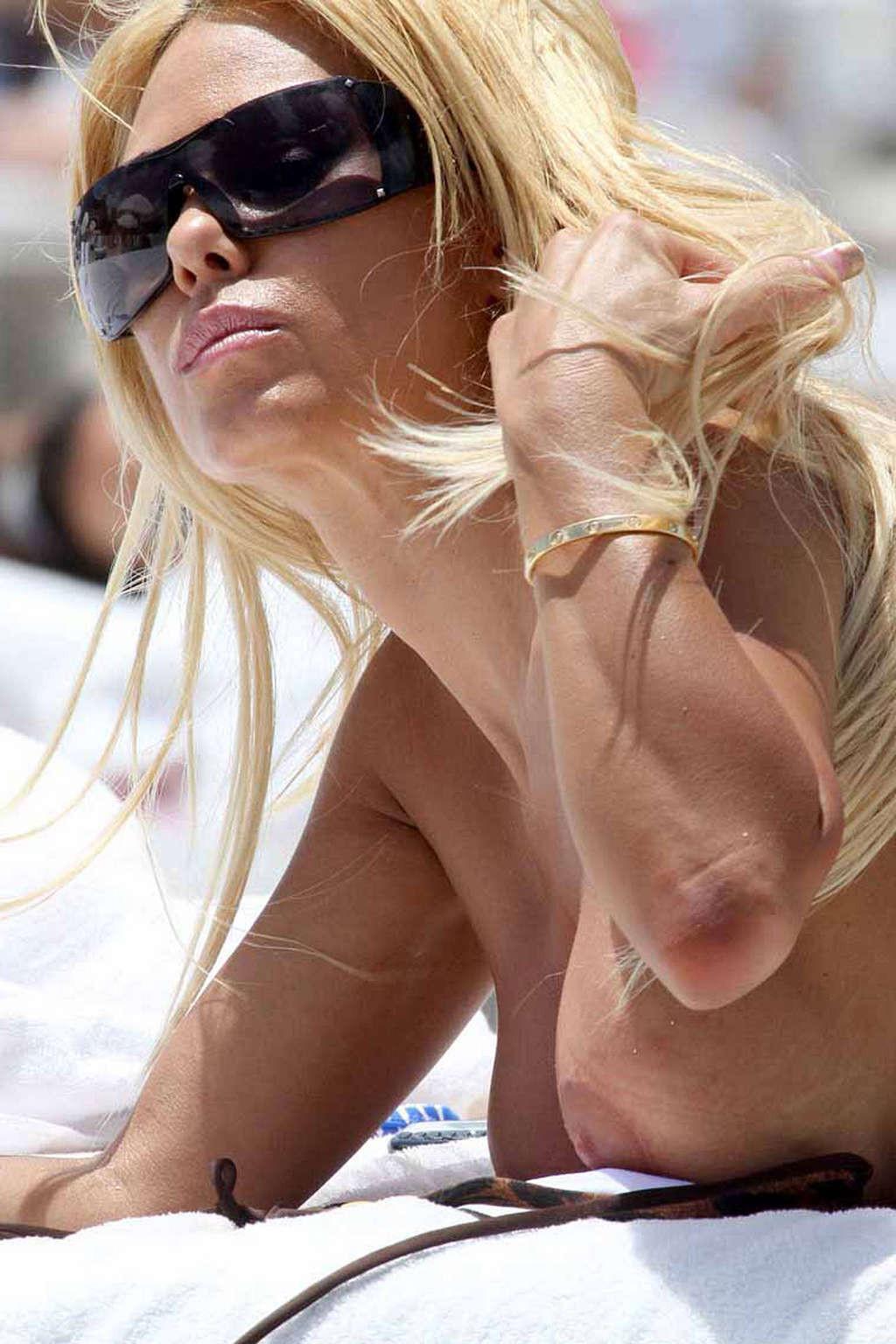 16P Shauna Sand big cleavage and leggy in mini skirt and topless