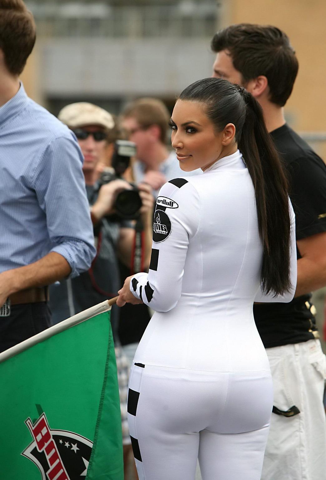 15P Kim Kardashian's cleavage  ass in skin tight racing outfit at Bullrun Race in NY
