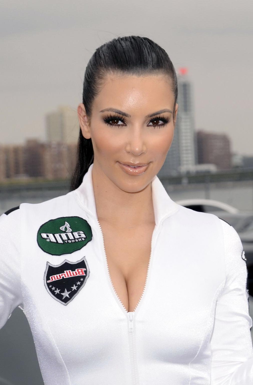 15P Kim Kardashian's cleavage  ass in skin tight racing outfit at Bullrun Race in NY