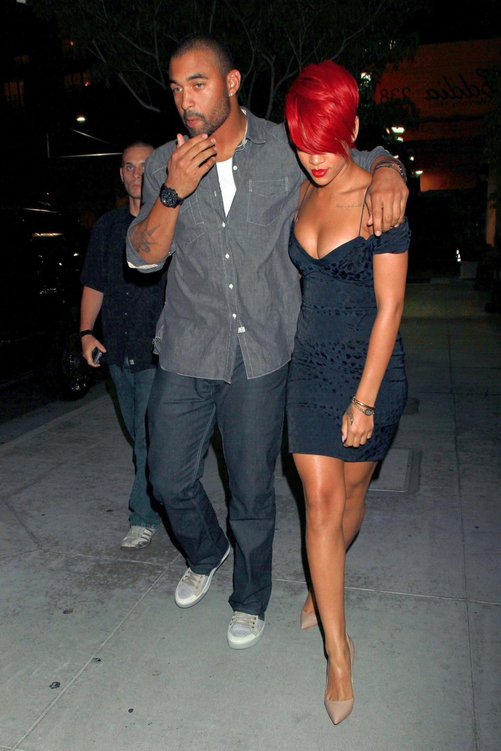 15P Rihanna shows huge cleavage wearing mini dress out in Hollywood