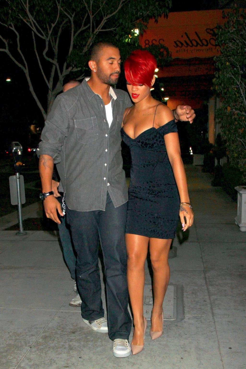 15P Rihanna shows huge cleavage wearing mini dress out in Hollywood