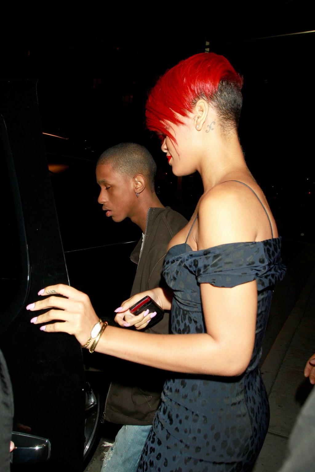 15P Rihanna shows huge cleavage wearing mini dress out in Hollywood