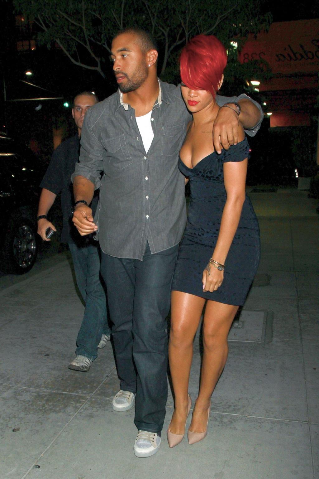 15P Rihanna shows huge cleavage wearing mini dress out in Hollywood