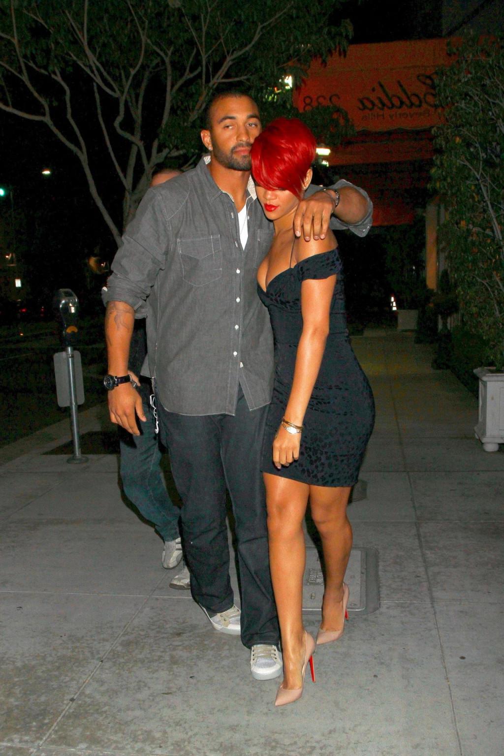 15P Rihanna shows huge cleavage wearing mini dress out in Hollywood