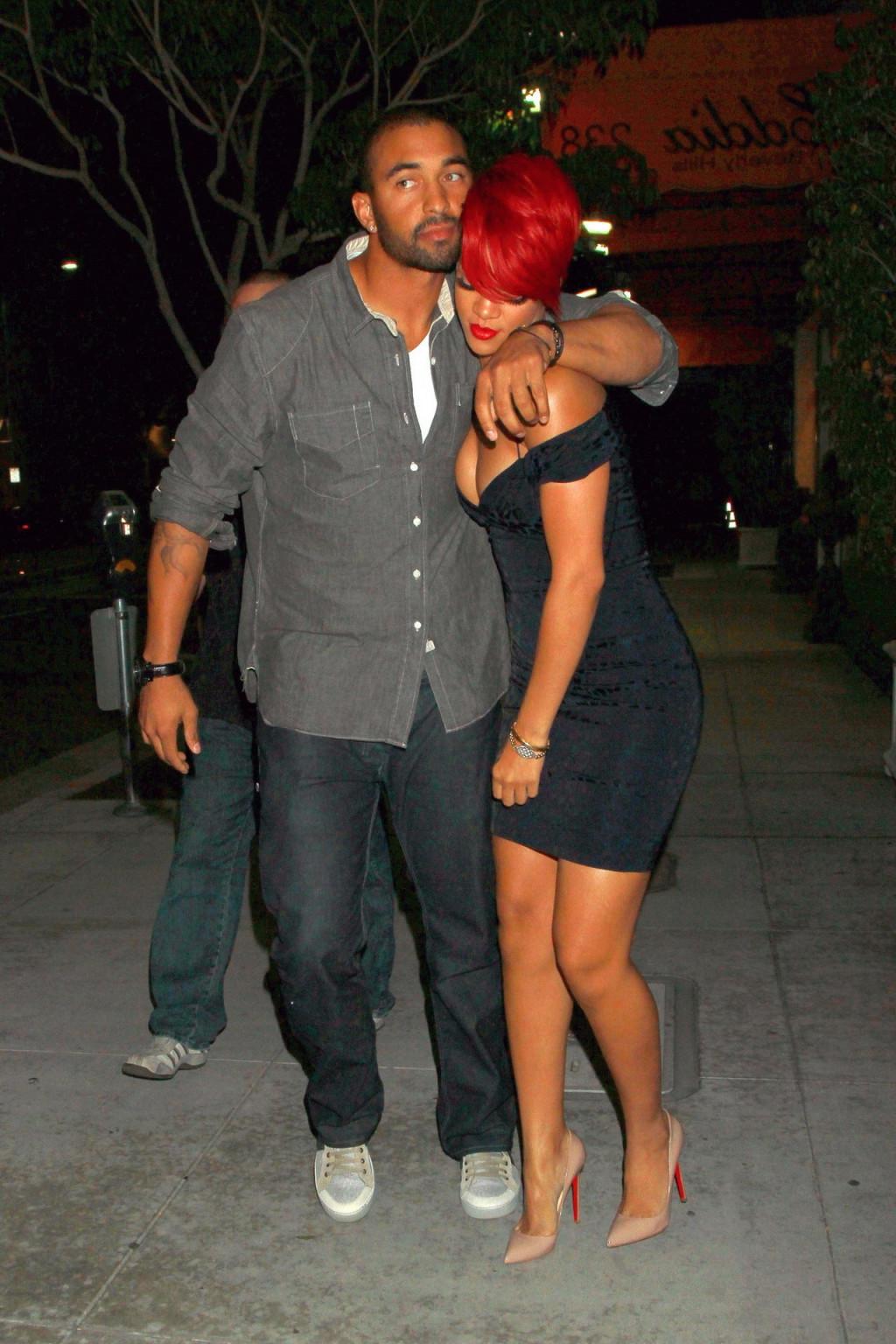 15P Rihanna shows huge cleavage wearing mini dress out in Hollywood