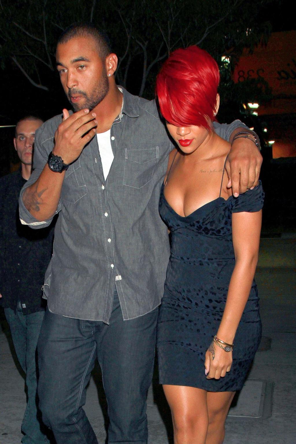 15P Rihanna shows huge cleavage wearing mini dress out in Hollywood