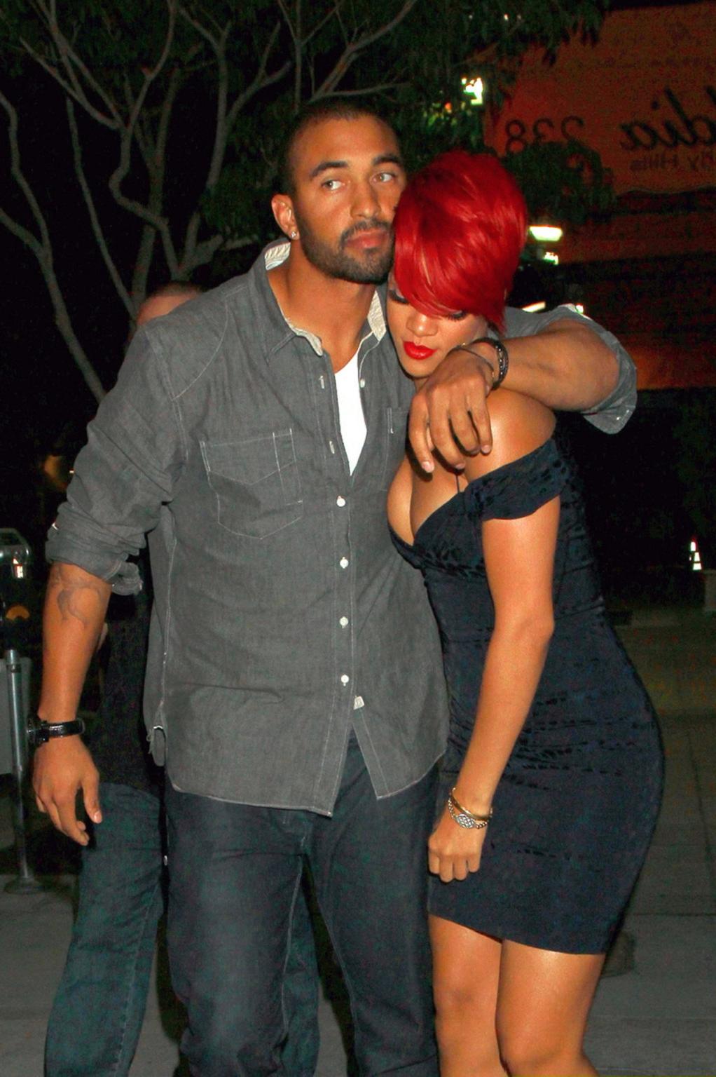 15P Rihanna shows huge cleavage wearing mini dress out in Hollywood