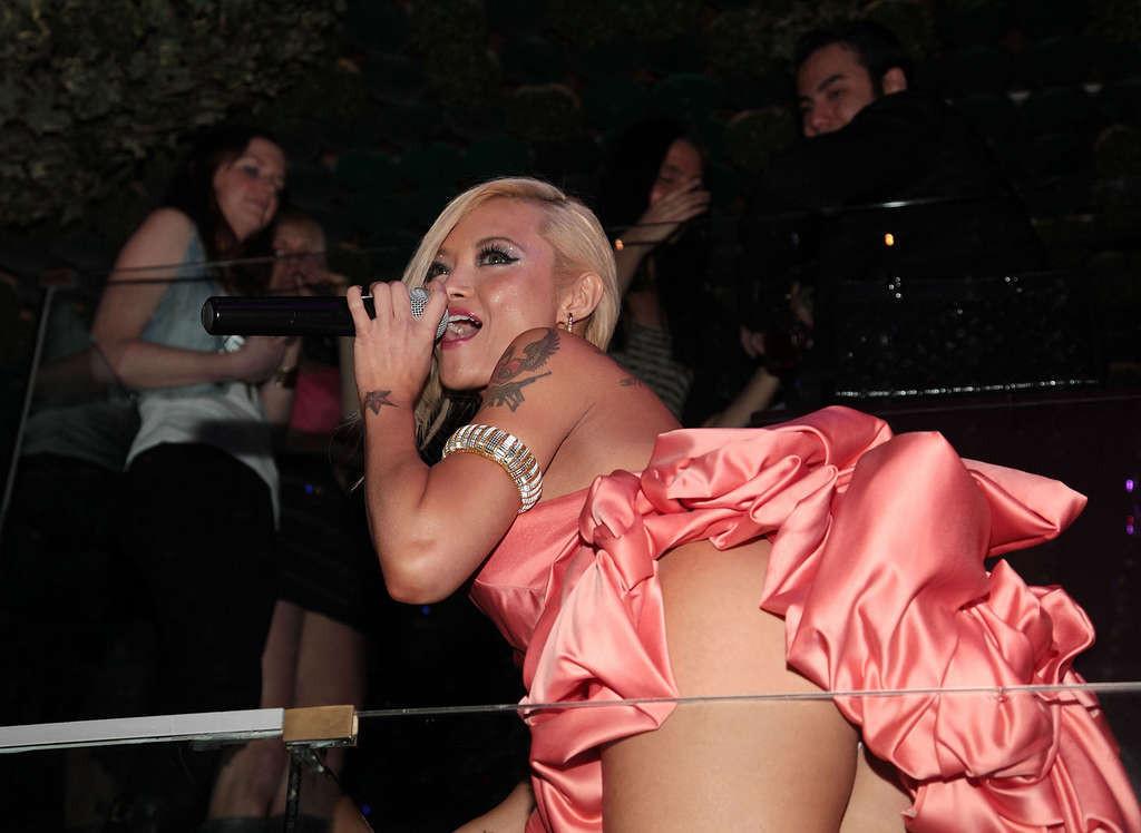 10P Tila Tequila nipple slip and showing panties upskirt on stage in orange dress