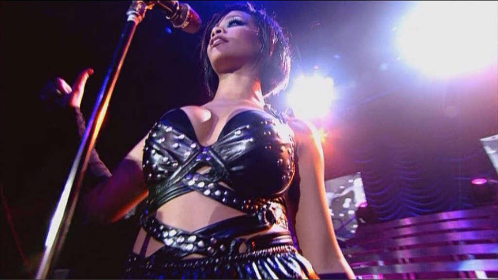 16P Rihanna show big cleavage and very leggy on stage