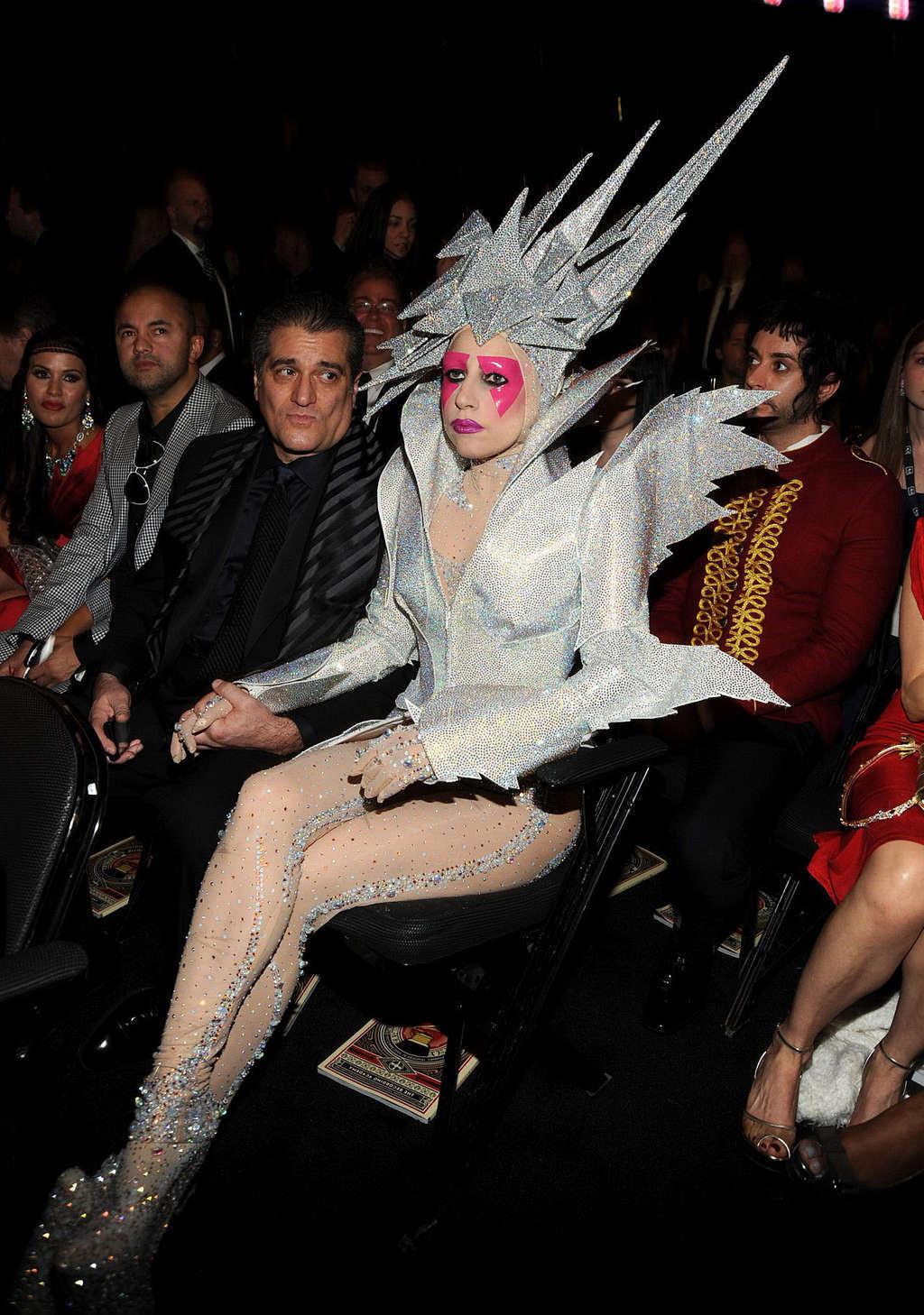 10P Lady Gaga in some strange outfit and posing topless