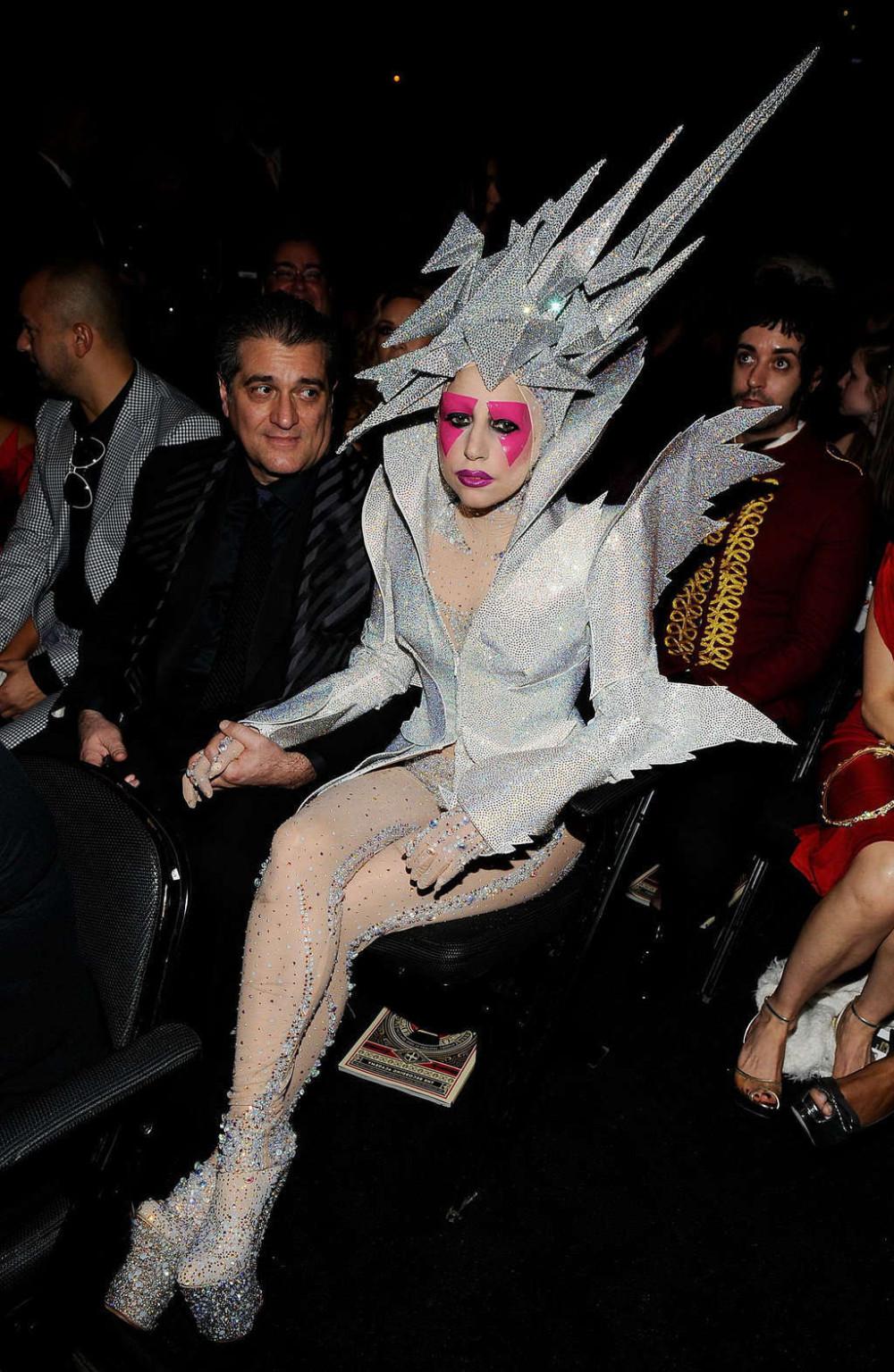 10P Lady Gaga in some strange outfit and posing topless