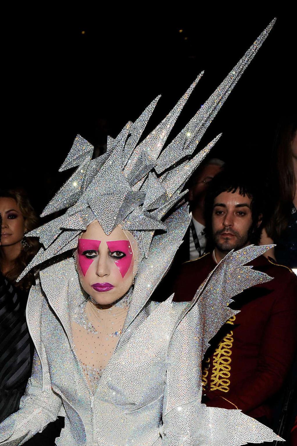 10P Lady Gaga in some strange outfit and posing topless