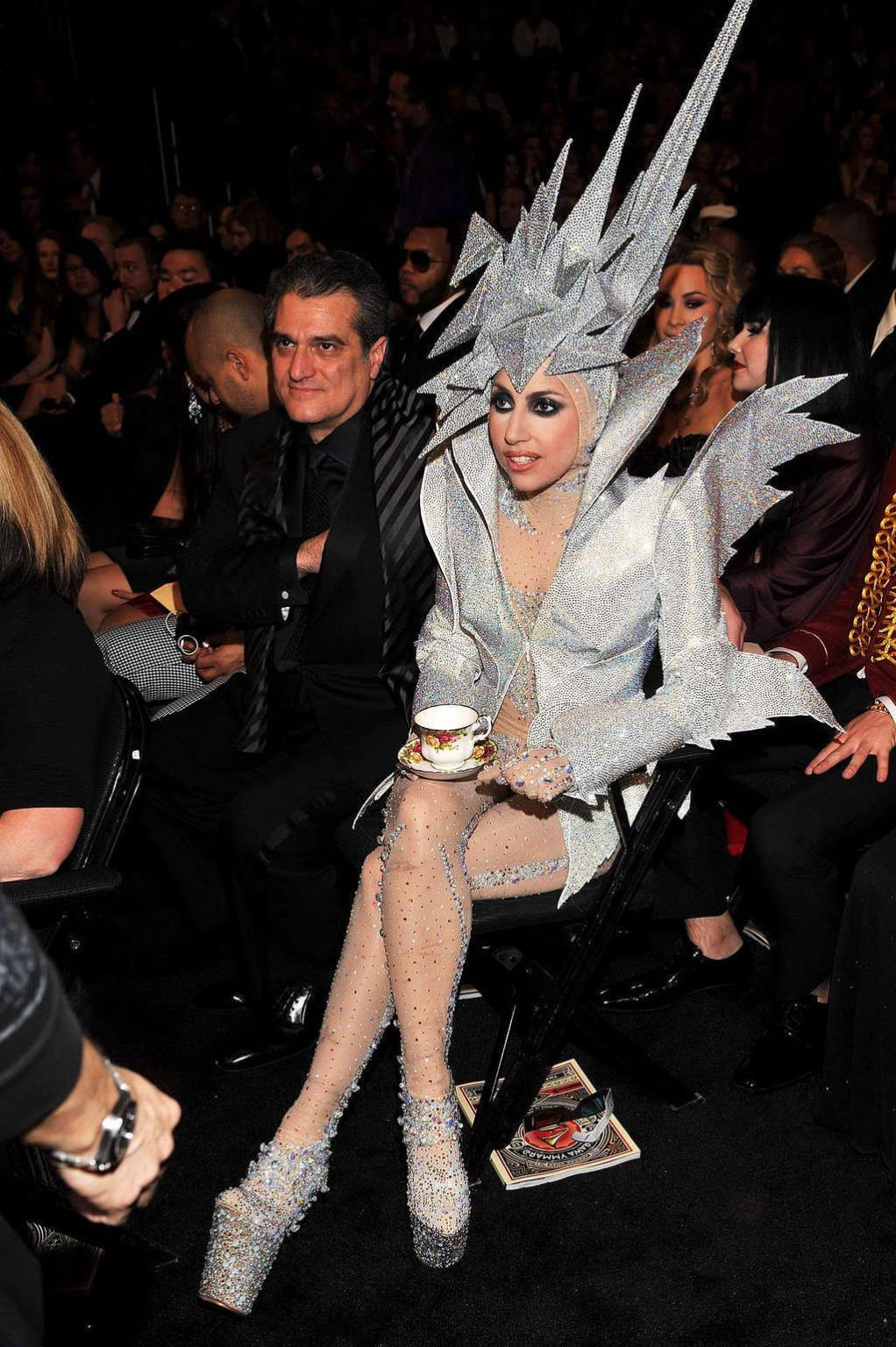 10P Lady Gaga in some strange outfit and posing topless