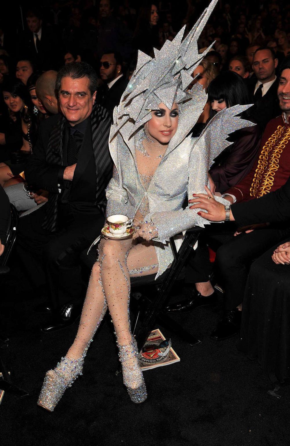 10P Lady Gaga in some strange outfit and posing topless