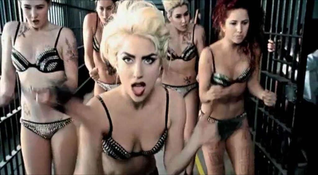 10P Lady Gaga in some strange outfit and posing topless