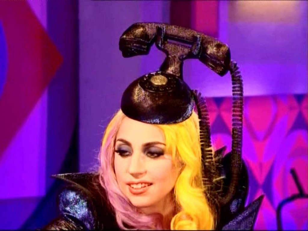 16P Lady Gaga in ripped fishnets stockings on stage and with long hair