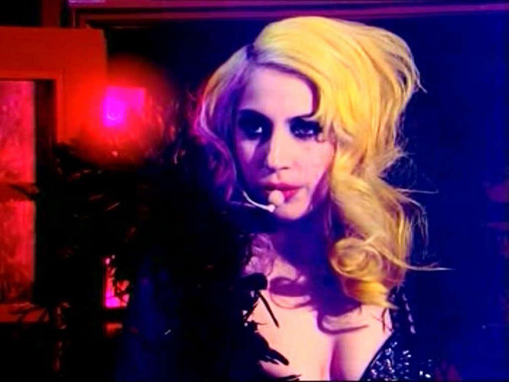 16P Lady Gaga in ripped fishnets stockings on stage and with long hair