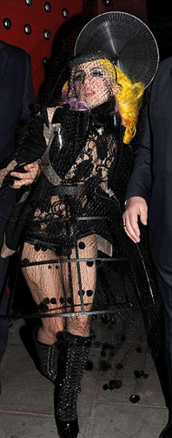 16P Lady Gaga in ripped fishnets stockings on stage and with long hair