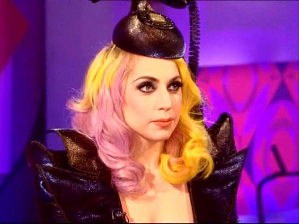 16P Lady Gaga in ripped fishnets stockings on stage and with long hair