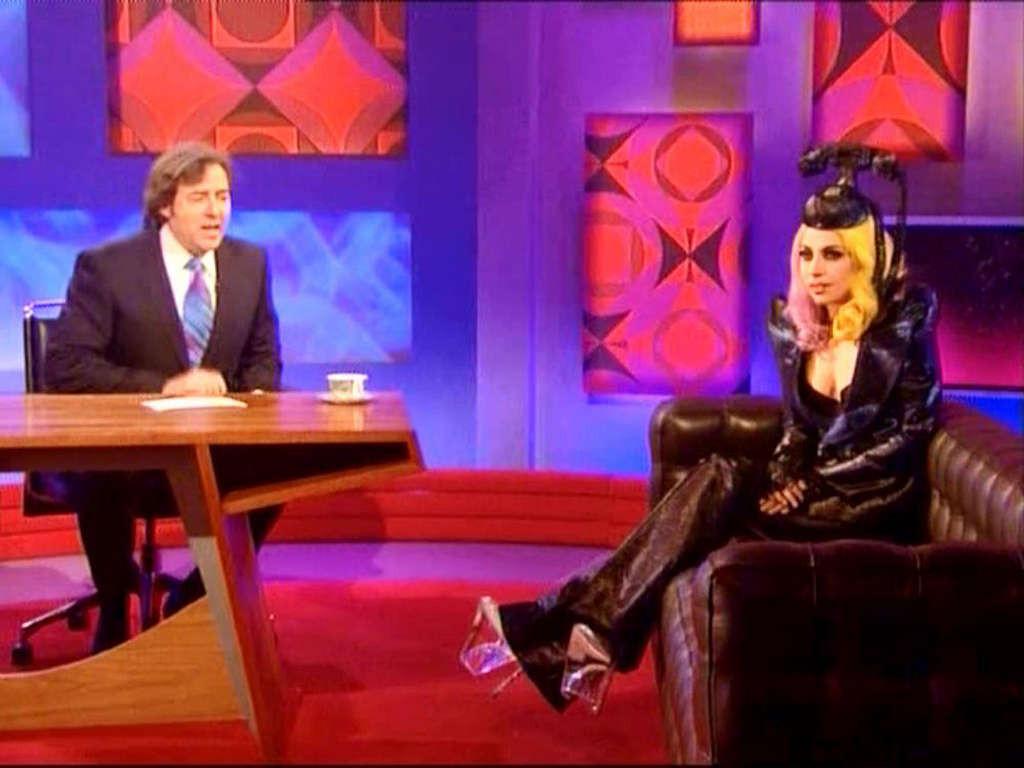 16P Lady Gaga in ripped fishnets stockings on stage and with long hair