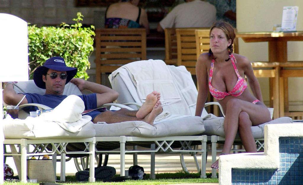 16P Tori Spelling sexy nipple slipand very hot ass on beach