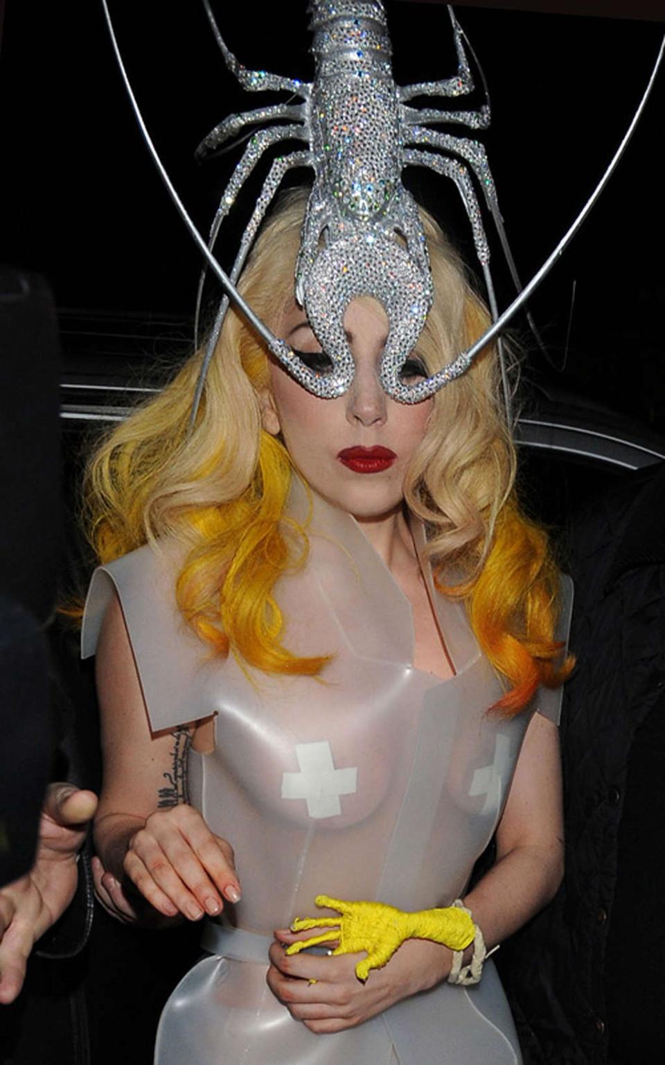 16P Lady Gaga showing her tits and thong in see thru dress