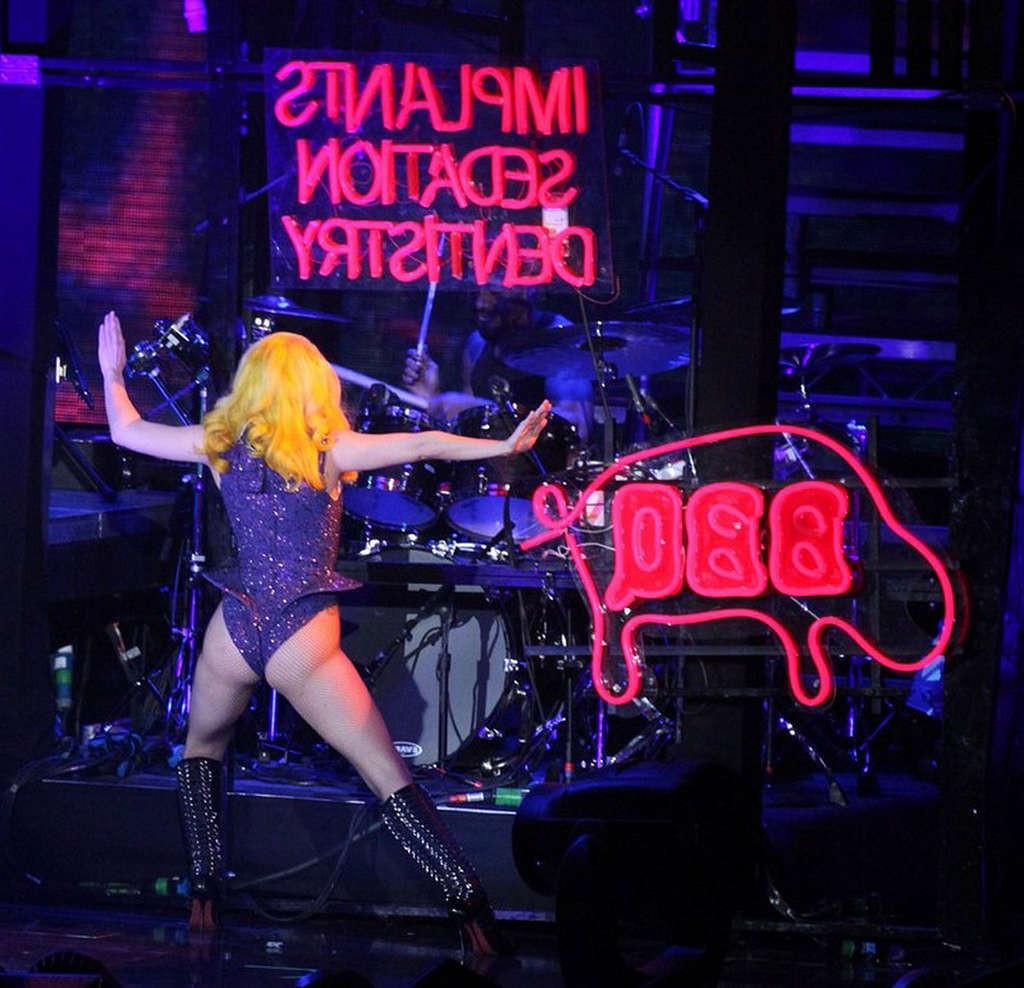 10P Lady Gaga showing her ass in onepiece outfit on stage and topless