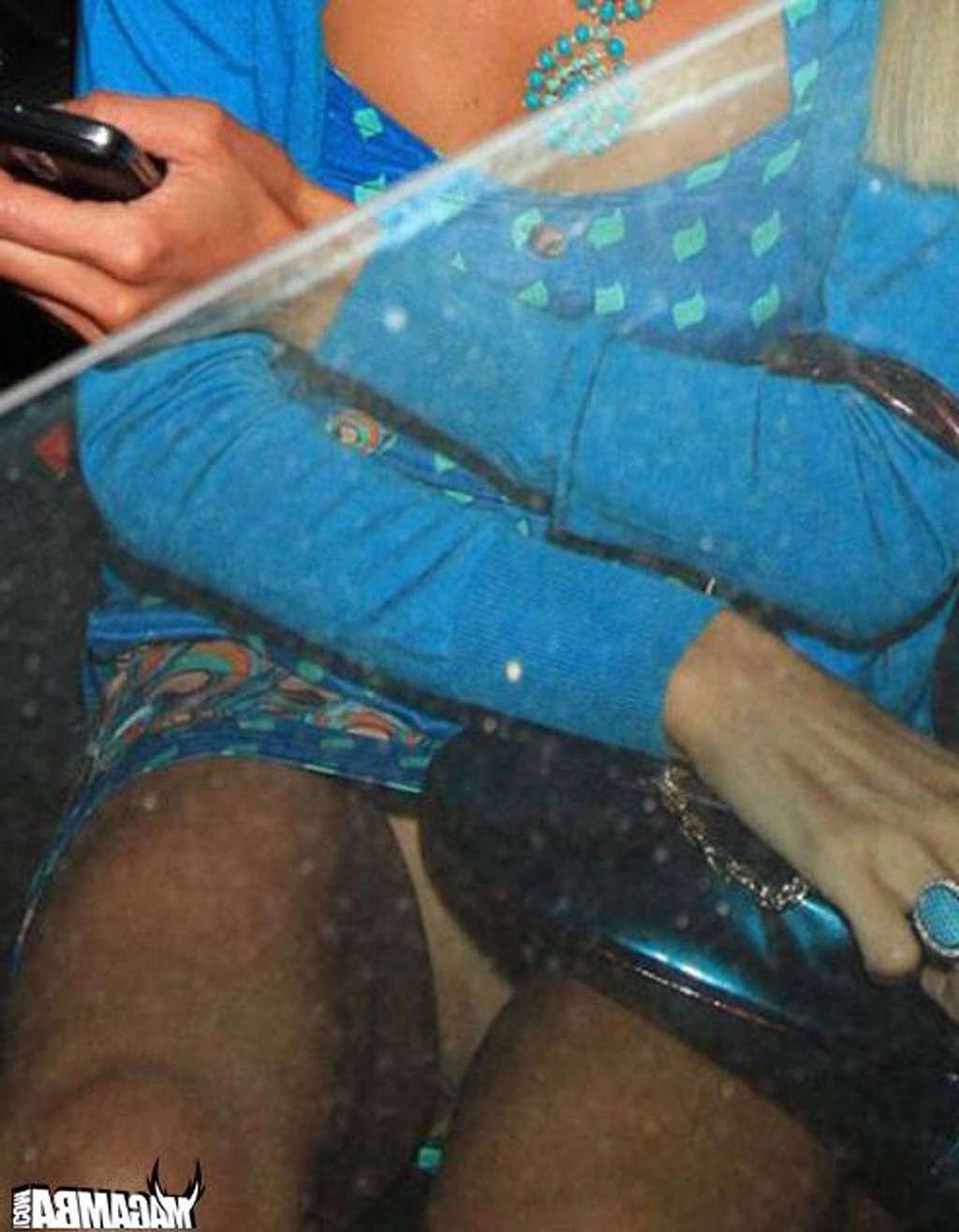 16P Paris Hilton show big cleavage in yellow mini skirt and her nice tits