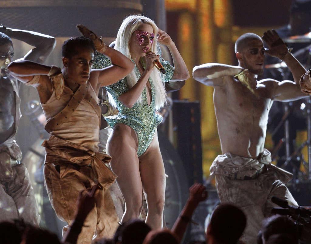 16P Lady Gaga exposing her nice ass in sexy outfit on stage