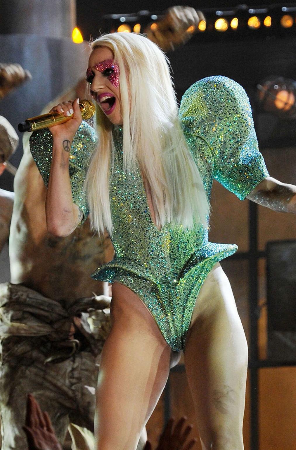 16P Lady Gaga exposing her nice ass in sexy outfit on stage