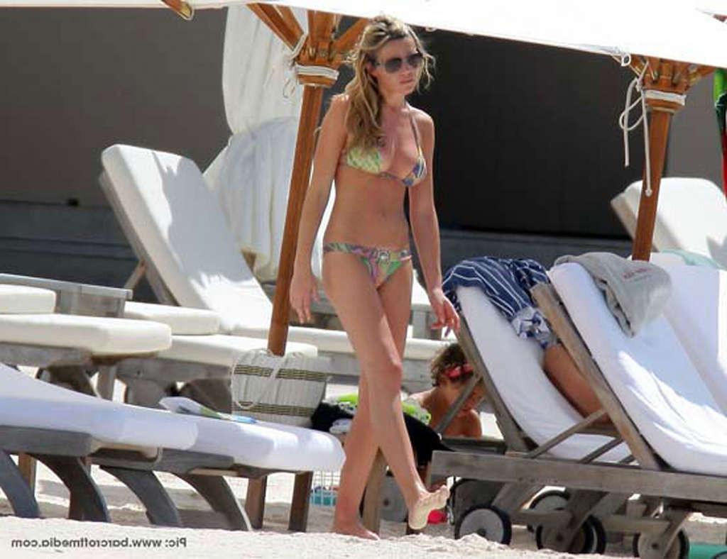 10P Abigail Clancy nipple slip paparazzi pictures and posing in see thru