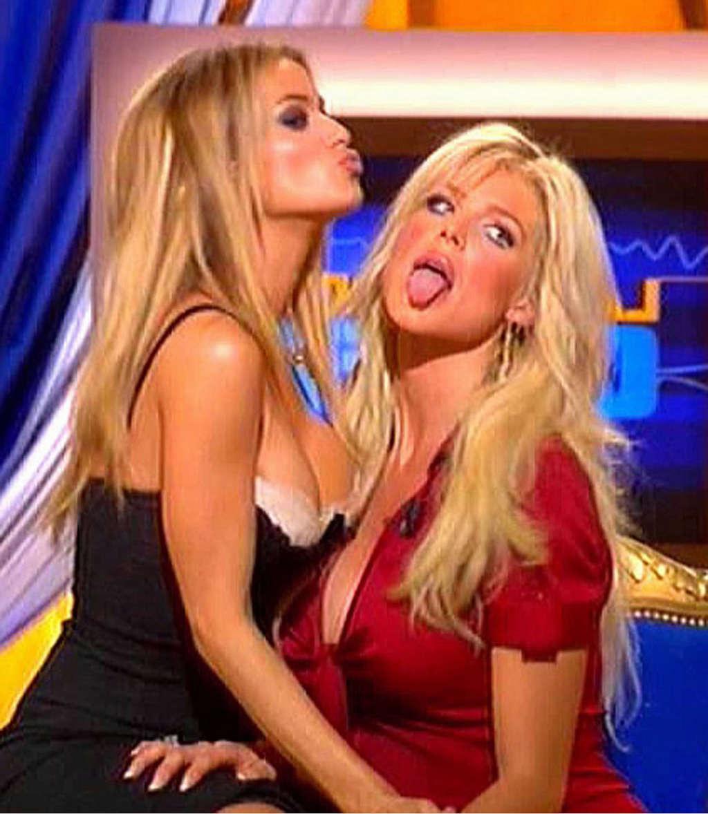 16P Carmen Electra performing a striptease in sexy underwear and showing hot body