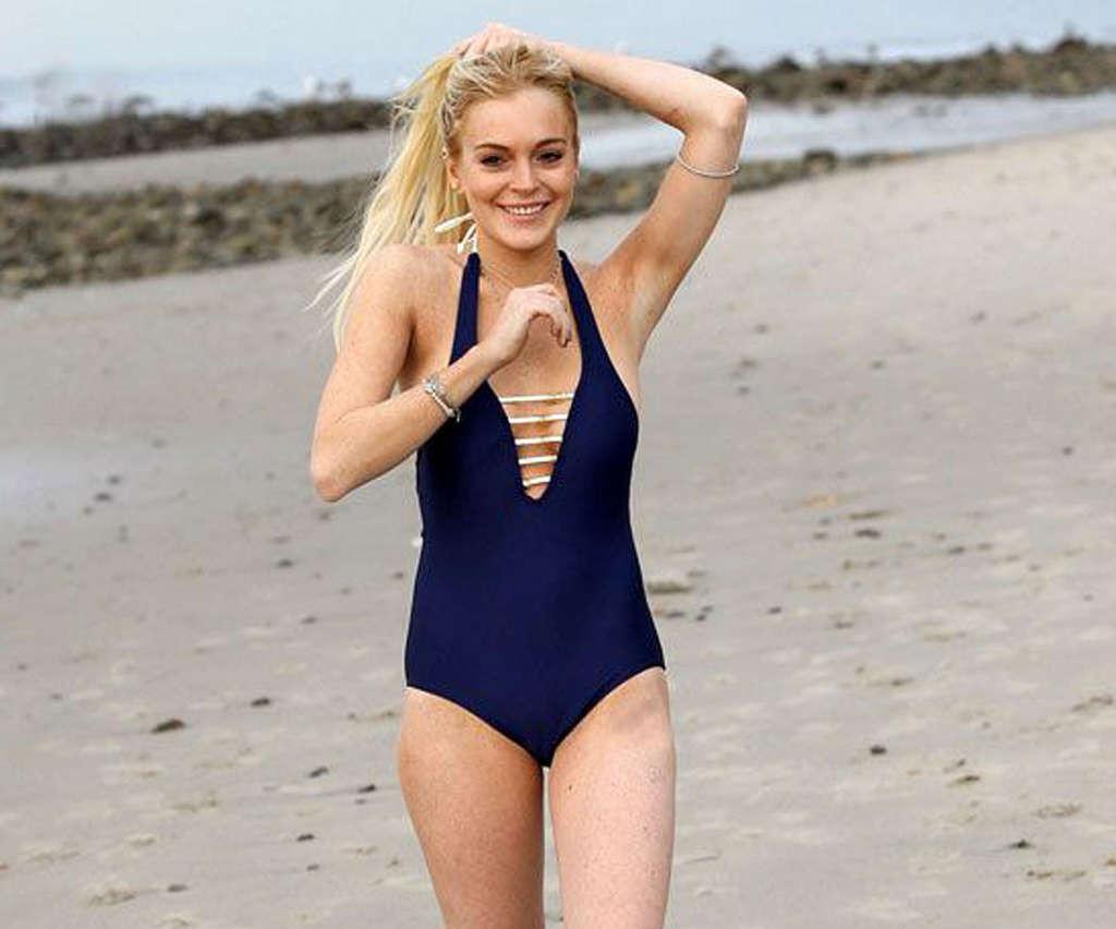 16P Lindsay Lohan in bikini and nipple slip and upskirt