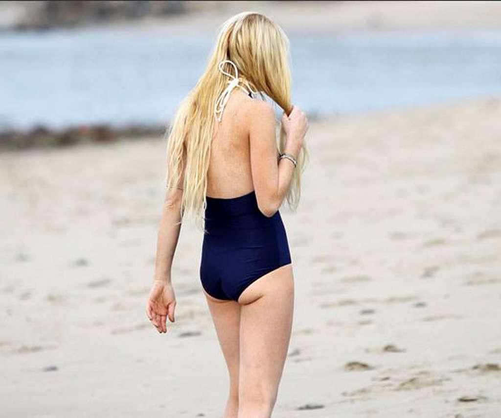16P Lindsay Lohan in bikini and nipple slip and upskirt