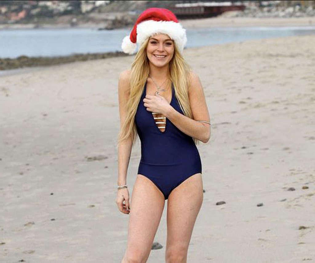 16P Lindsay Lohan in bikini and nipple slip and upskirt