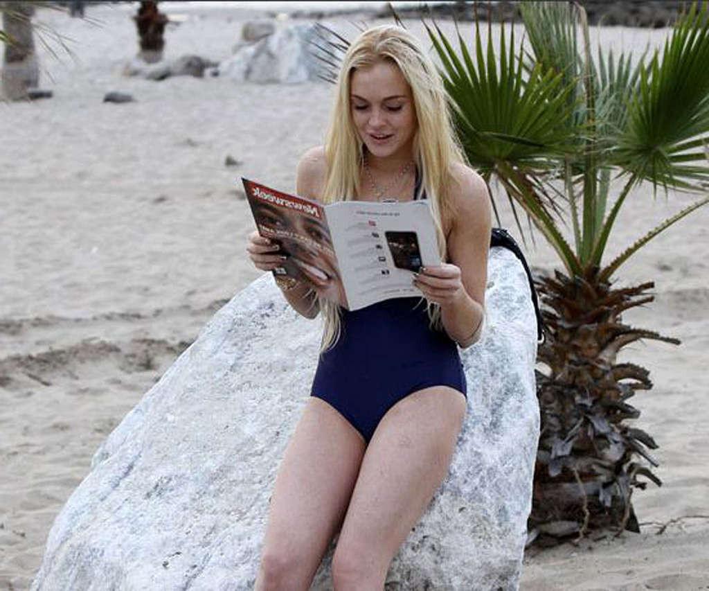 16P Lindsay Lohan in bikini and nipple slip and upskirt