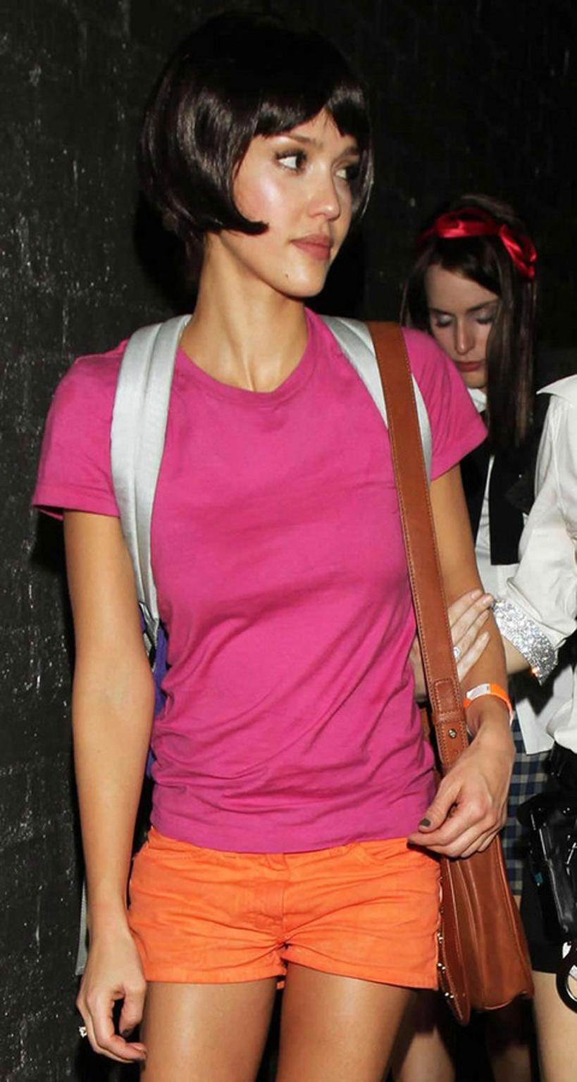 16P Jessica Alba posing and showing nice and sexy body and has a nipple slip