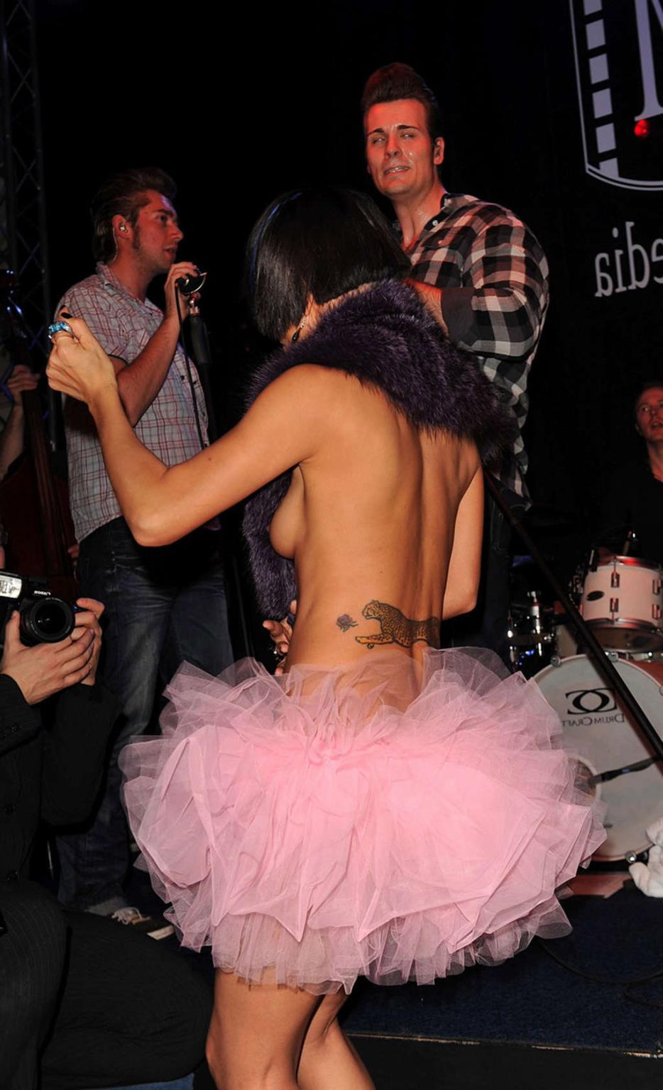 16P Bai Ling has a nipple slip while she is performing her show