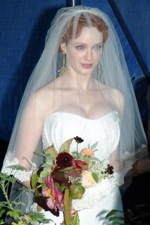 15P Christina Hendricks big cleavage in wedding dress