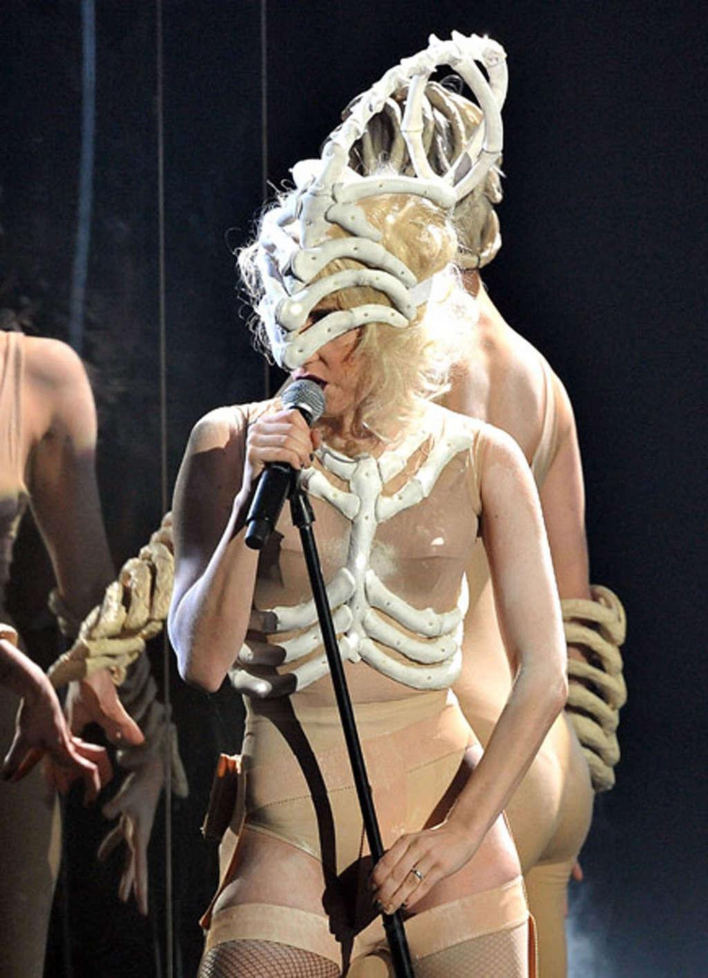 16P Lady Gaga performing in some strange outfit on concert and upskirt pictures