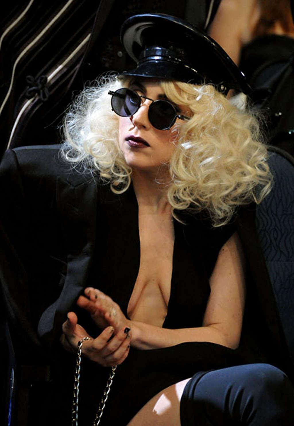 16P Lady Gaga performing in some strange outfit on concert and upskirt pictures