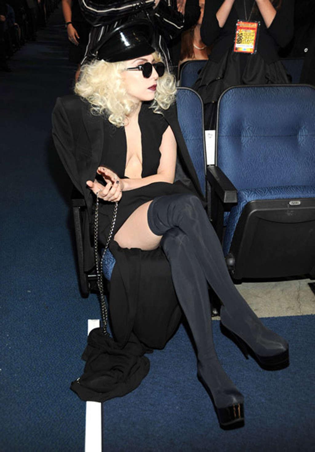 16P Lady Gaga performing in some strange outfit on concert and upskirt pictures
