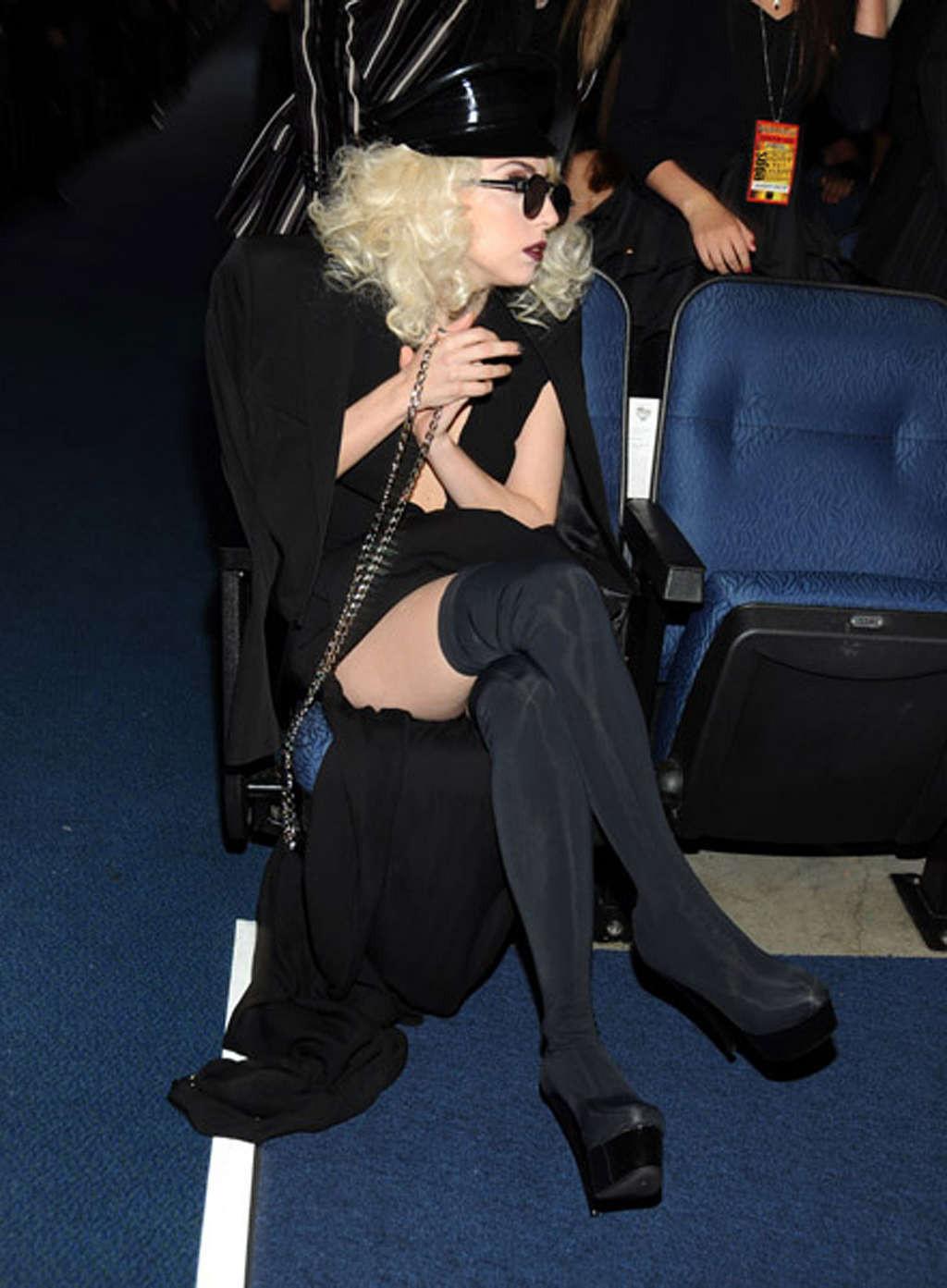 16P Lady Gaga performing in some strange outfit on concert and upskirt pictures
