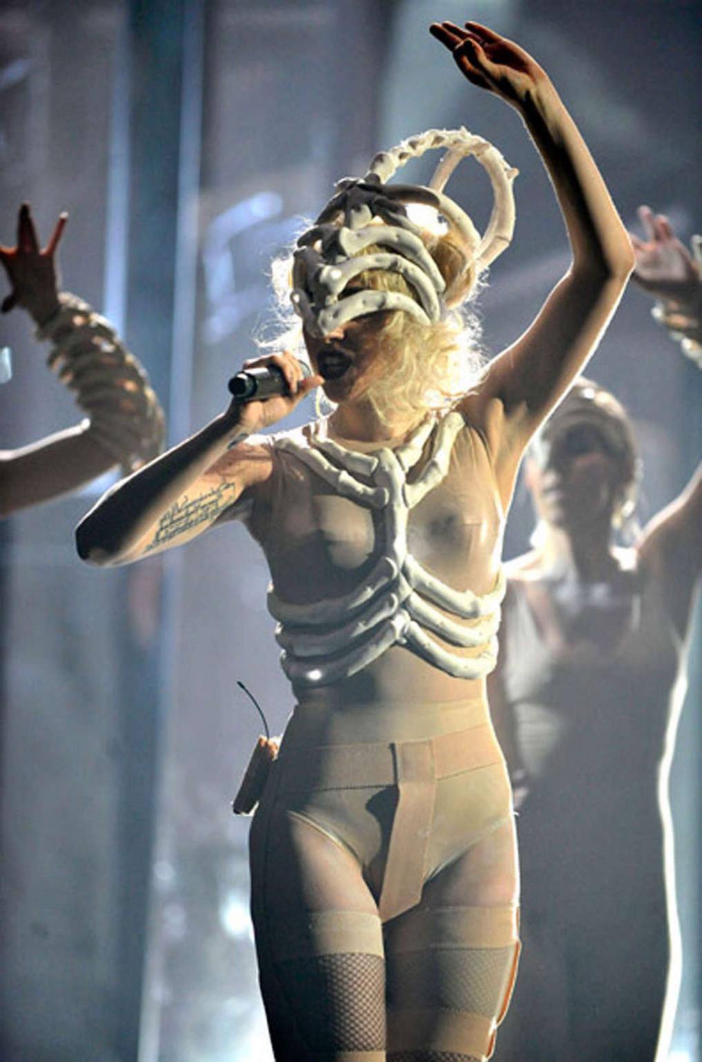 16P Lady Gaga performing in some strange outfit on concert and upskirt pictures