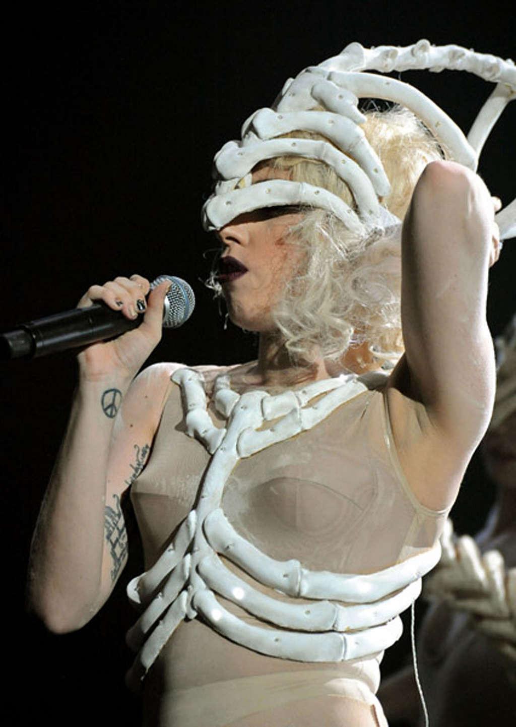 16P Lady Gaga performing in some strange outfit on concert and upskirt pictures