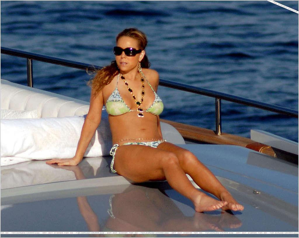 16P Mariah Carey in bikini on yacht paparazzi pictures and nipple slip
