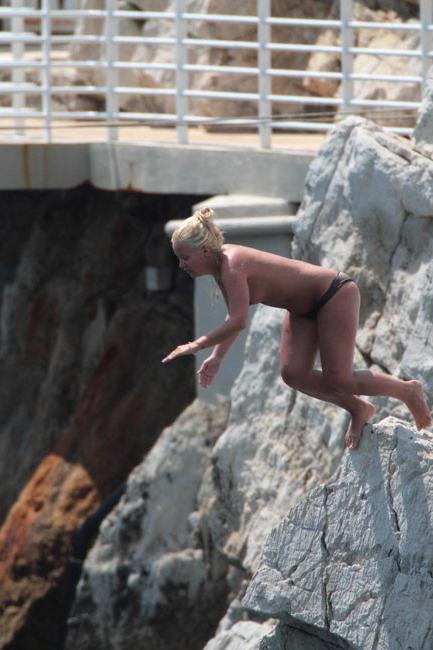 15P Lily Allen nipple slip and topless cliff jumping