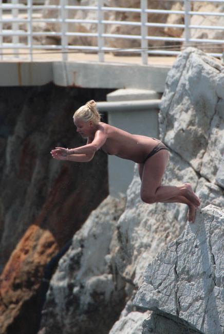 15P Lily Allen nipple slip and topless cliff jumping