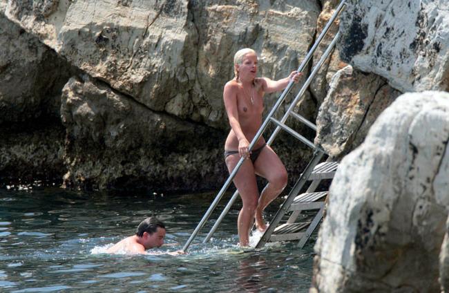 15P Lily Allen nipple slip and topless cliff jumping