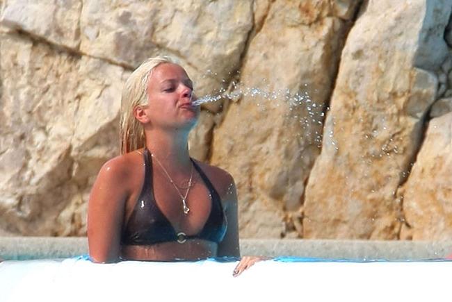 15P Lily Allen nipple slip and topless cliff jumping
